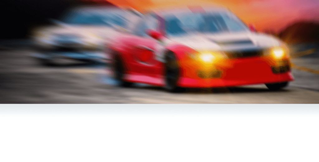 two blurred racecars